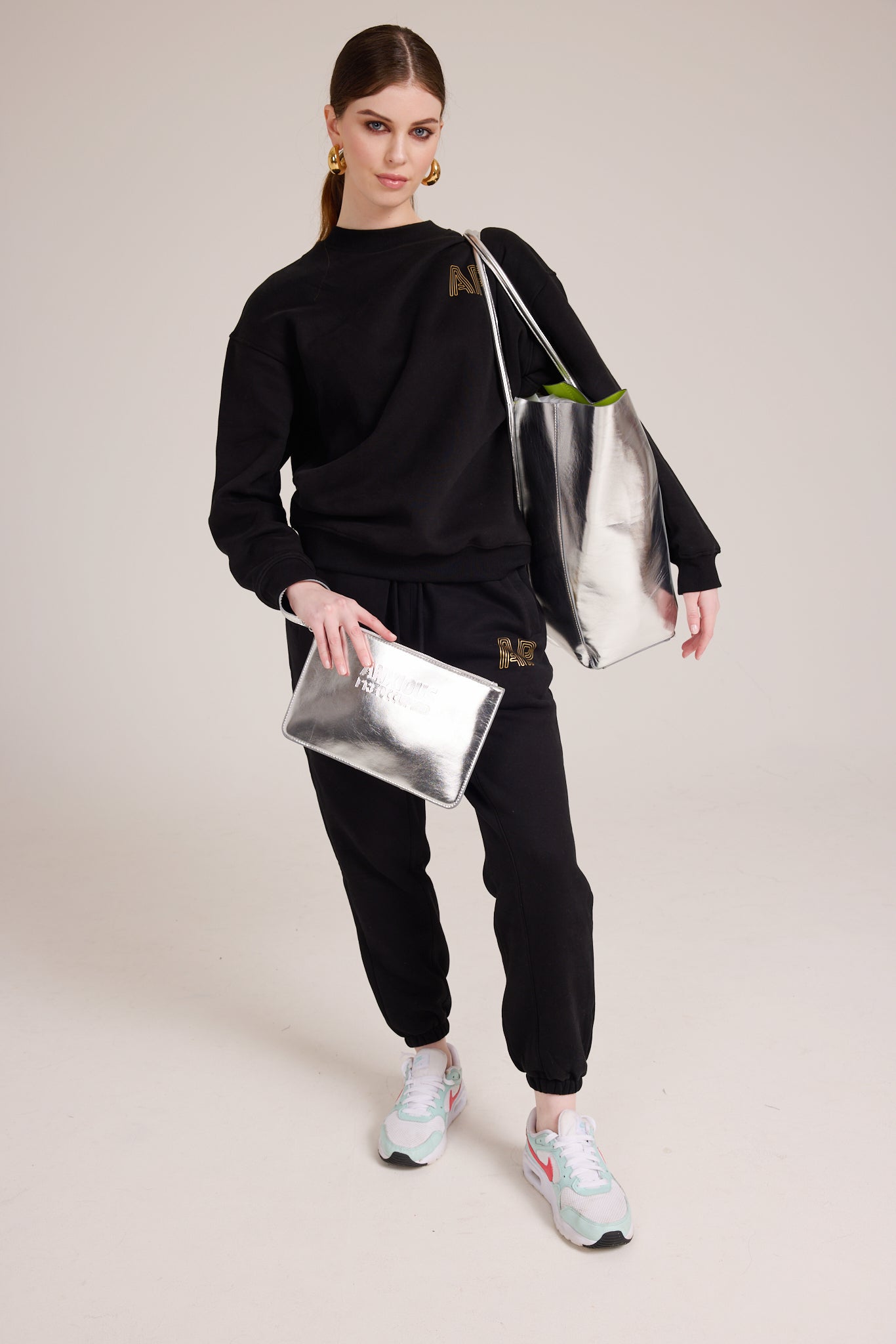 Cozy black tracksuit bottoms with AP logo on front right pocket in gold
