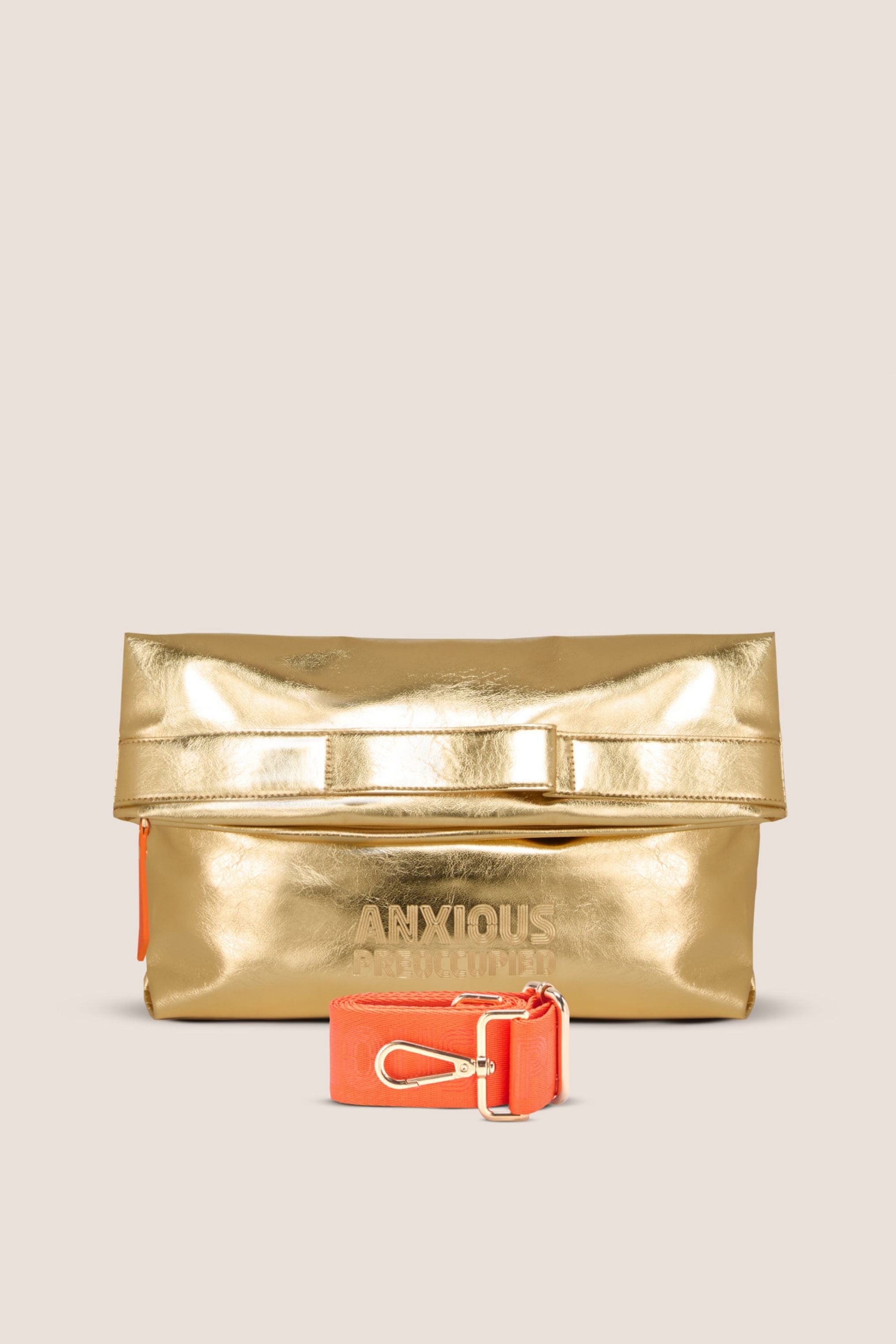 The Convertible Clutch to Tote: Gold