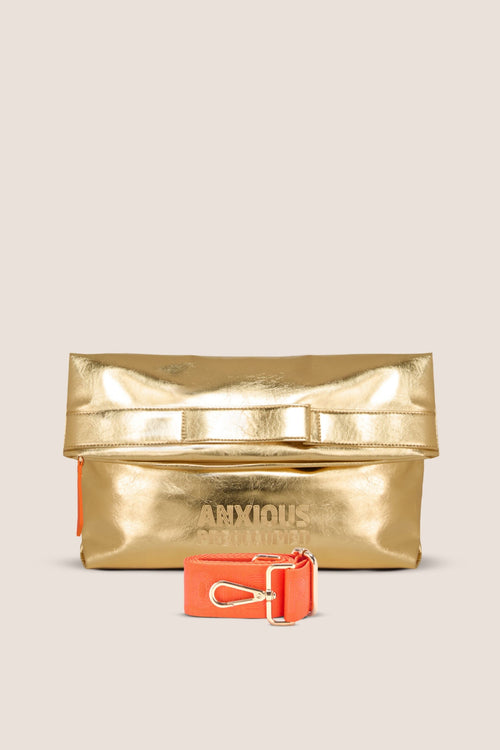 Load image 1 in gallery view. The Convertible Clutch to Tote: Gold