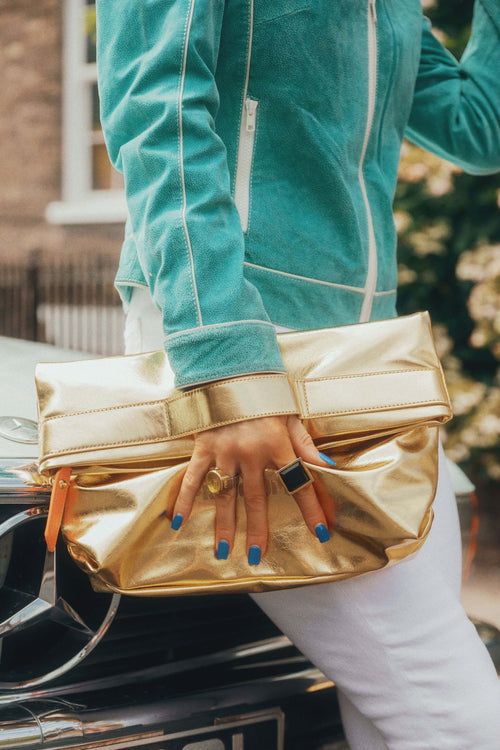 Load image 1 in gallery view. The Convertible Clutch to Tote: Gold