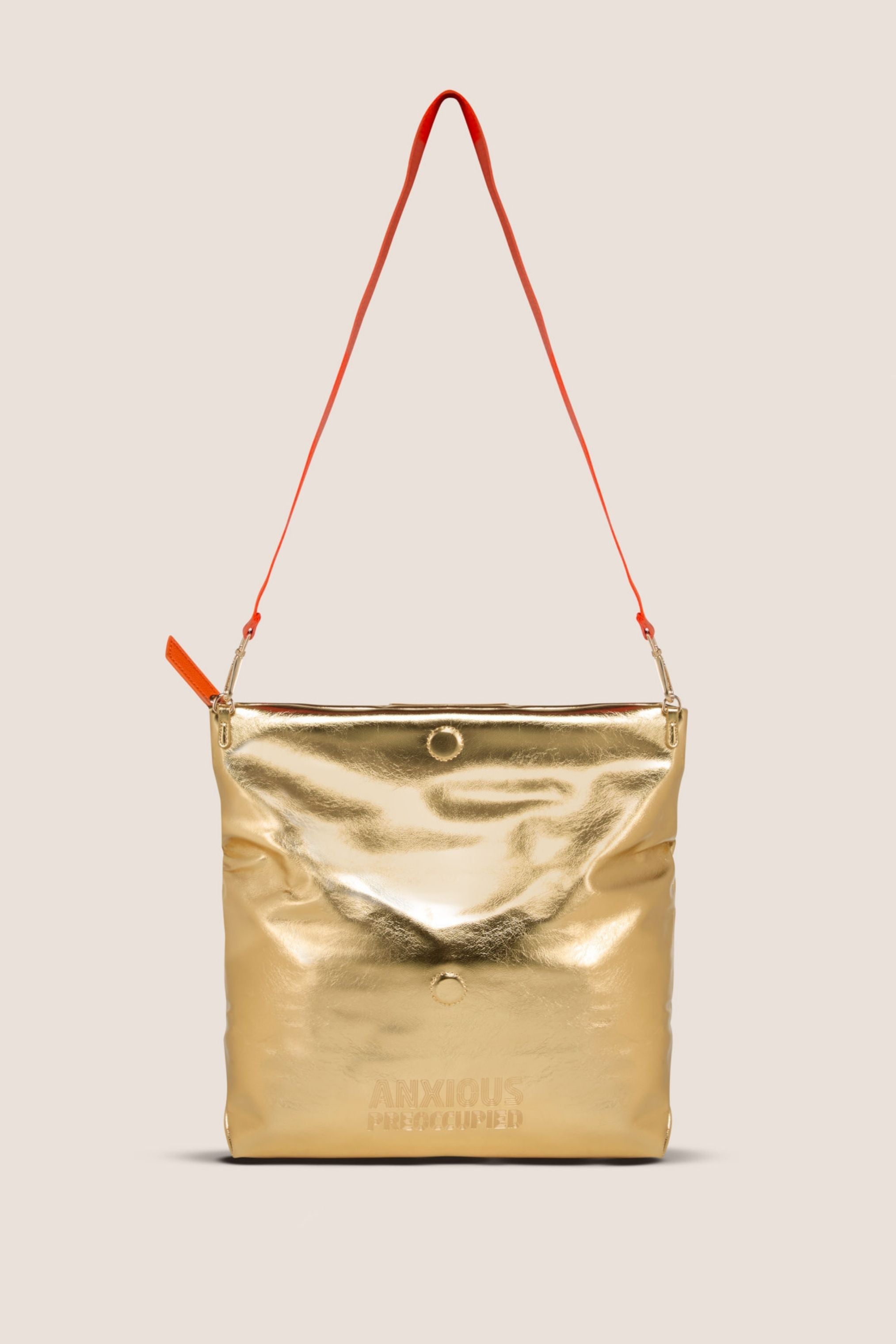 The Convertible Clutch to Tote: Gold