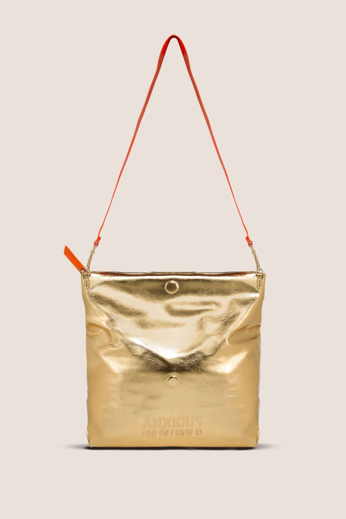 Load image 1 in gallery view. The Convertible Clutch to Tote: Gold
