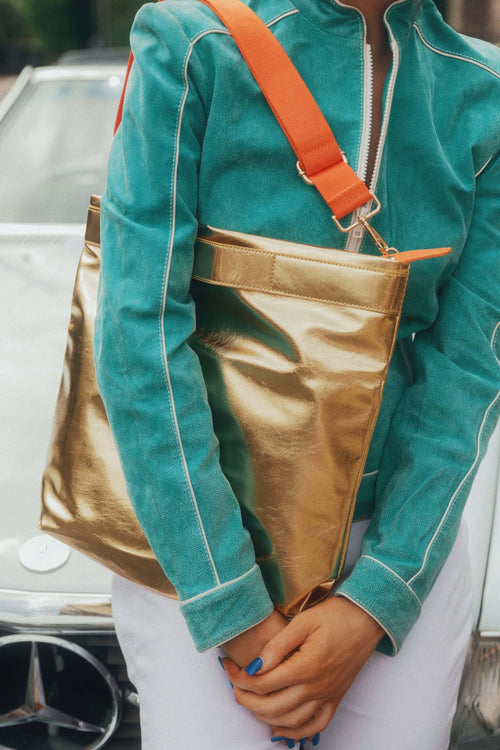 Load image 1 in gallery view. The Convertible Clutch to Tote: Gold