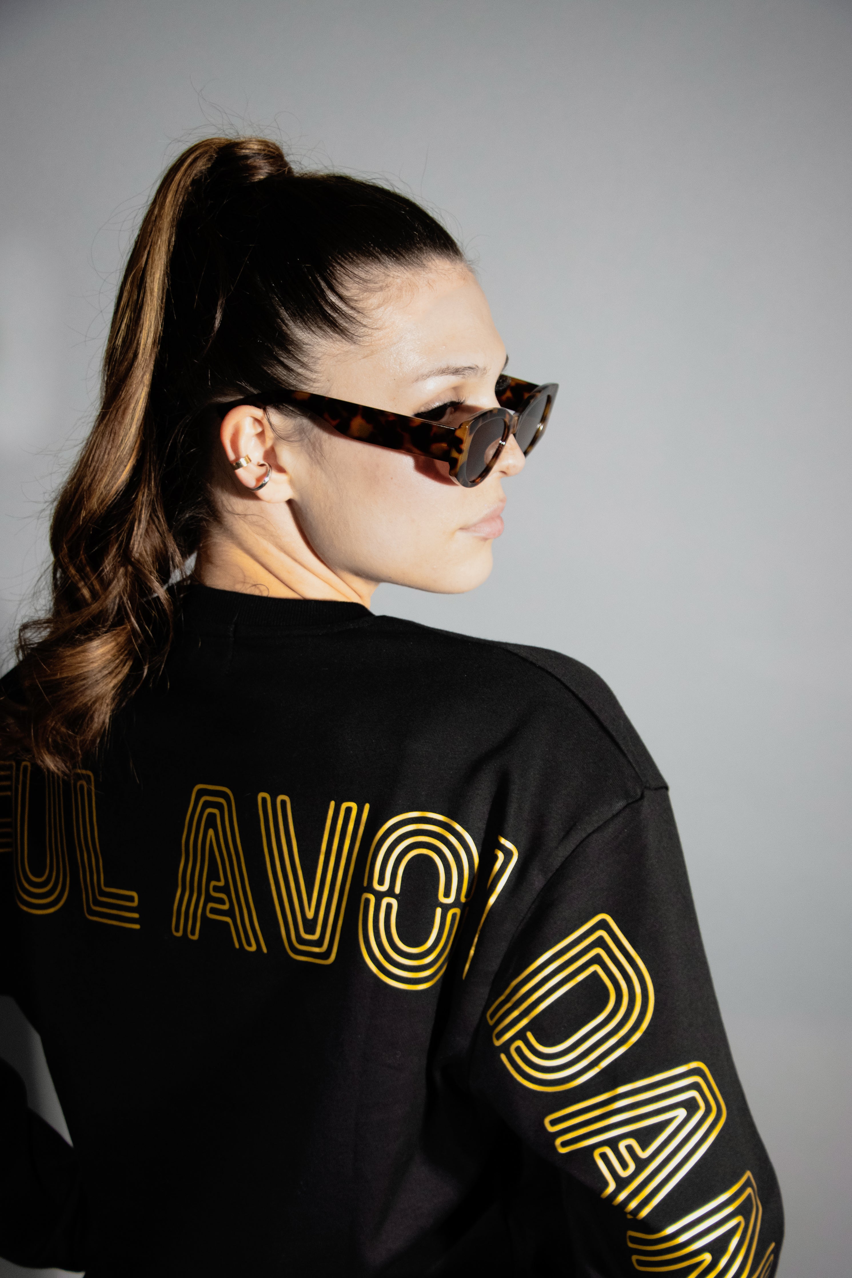 Fearful avoidant black lightweight sweater with gold lettering